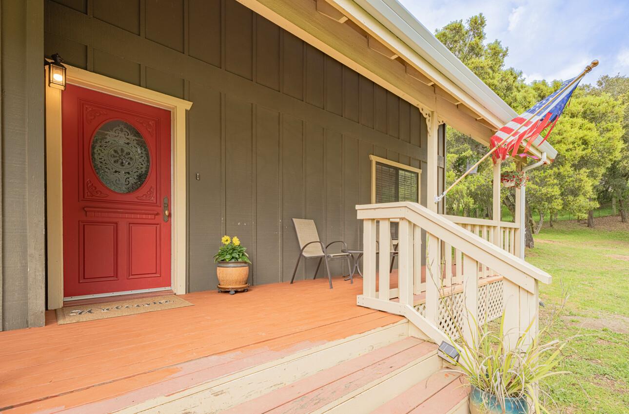 744 Seely Avenue Aromas, CA 95004 - Photo 16 of 55 a view of a house with wooden wall and roof
