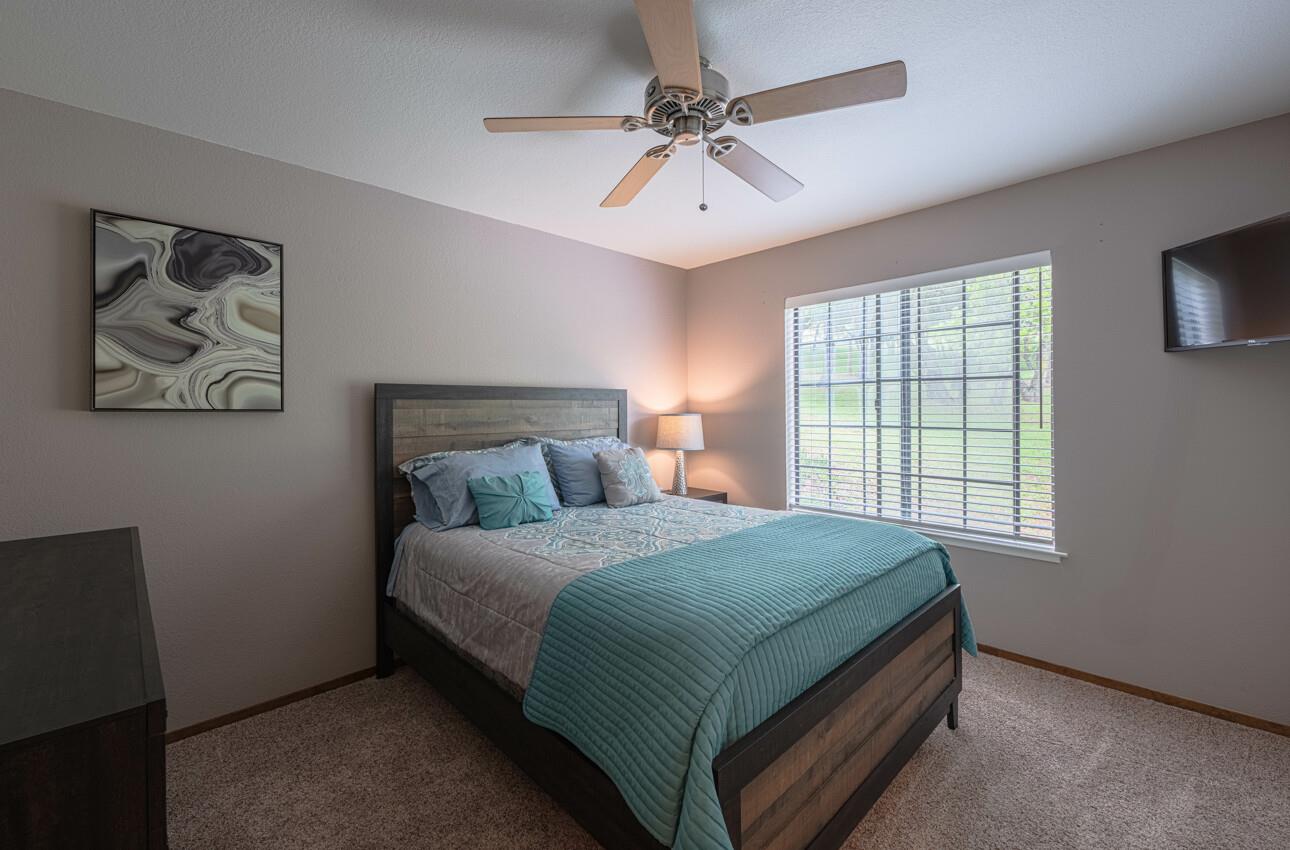 744 Seely Avenue Aromas, CA 95004 - Photo 31 of 55 a bedroom with a bed and a window