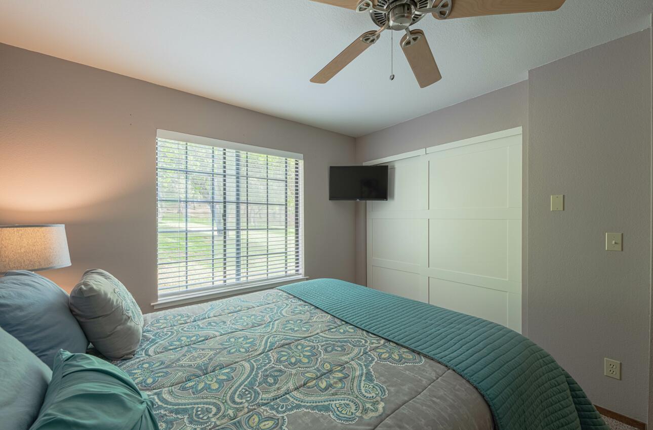 744 Seely Avenue Aromas, CA 95004 - Photo 32 of 55 a bedroom with a bed and window