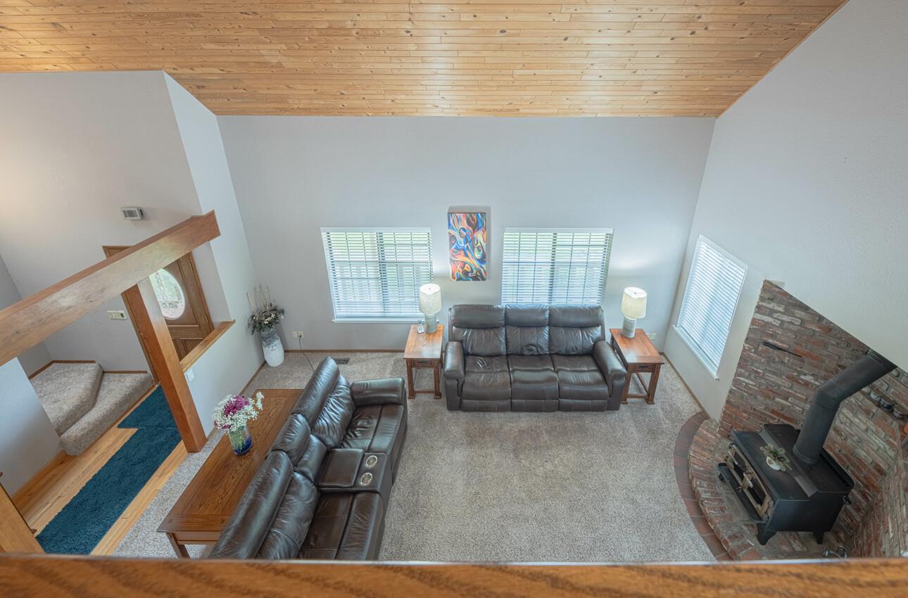 744 Seely Avenue Aromas, CA 95004 - Photo 38 of 55 a living room with furniture and a wooden floor