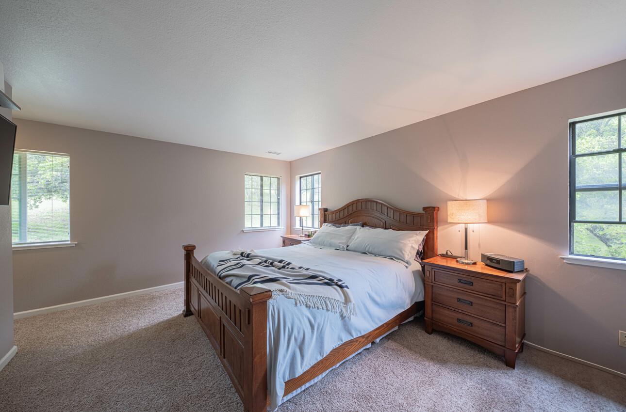 744 Seely Avenue Aromas, CA 95004 - Photo 39 of 55 a bedroom with a bed and a window