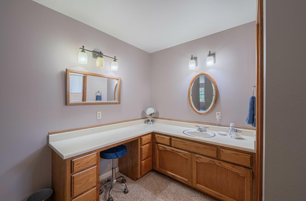 744 Seely Avenue Aromas, CA 95004 - Photo 42 of 55 a bathroom with a sink and a mirror