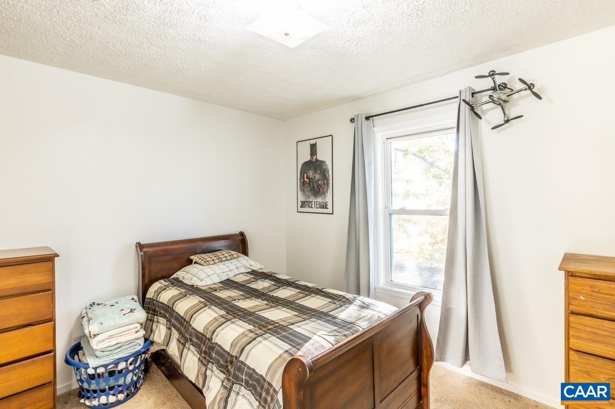 435 Courthouse Mountain Road Madison, VA 22727 - Photo 58 of 69 a bedroom with a bed and a window