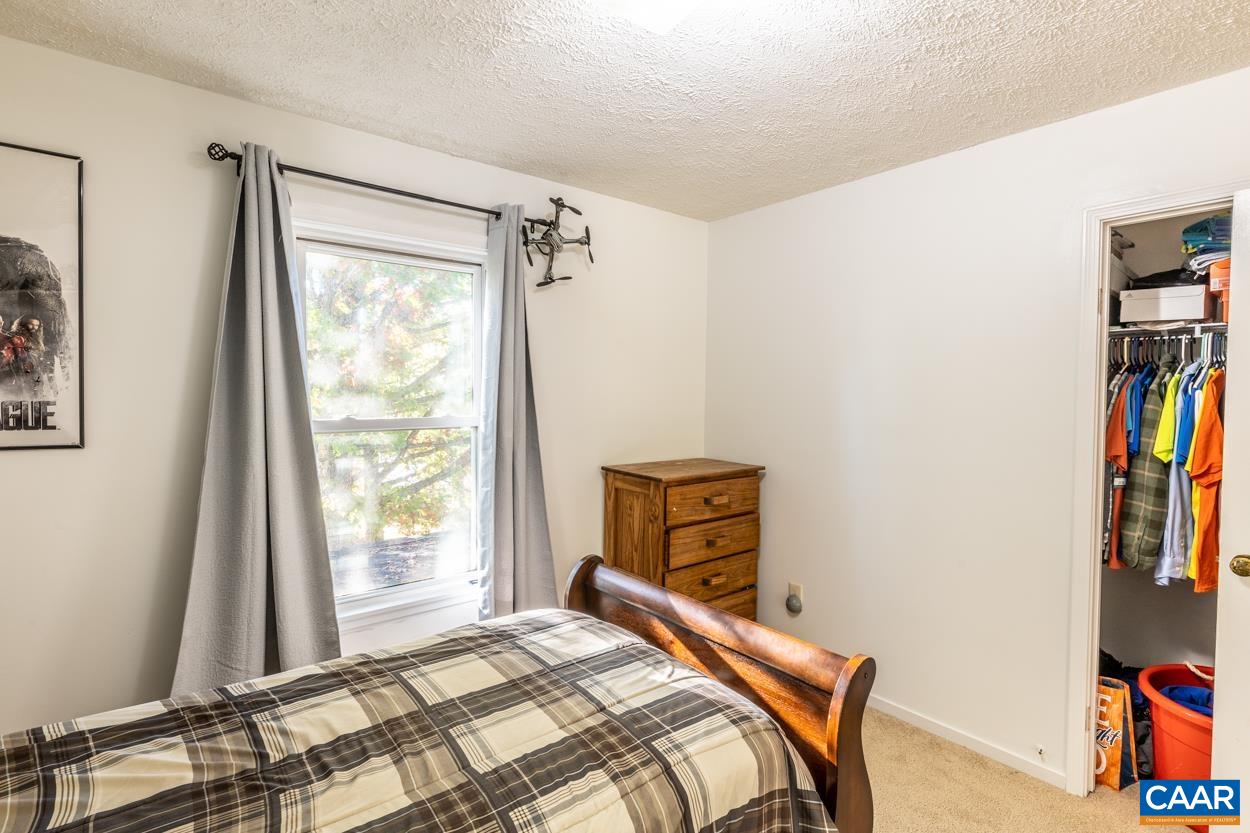 435 Courthouse Mountain Road Madison, VA 22727 - Photo 59 of 69 a bedroom with a bed and a window