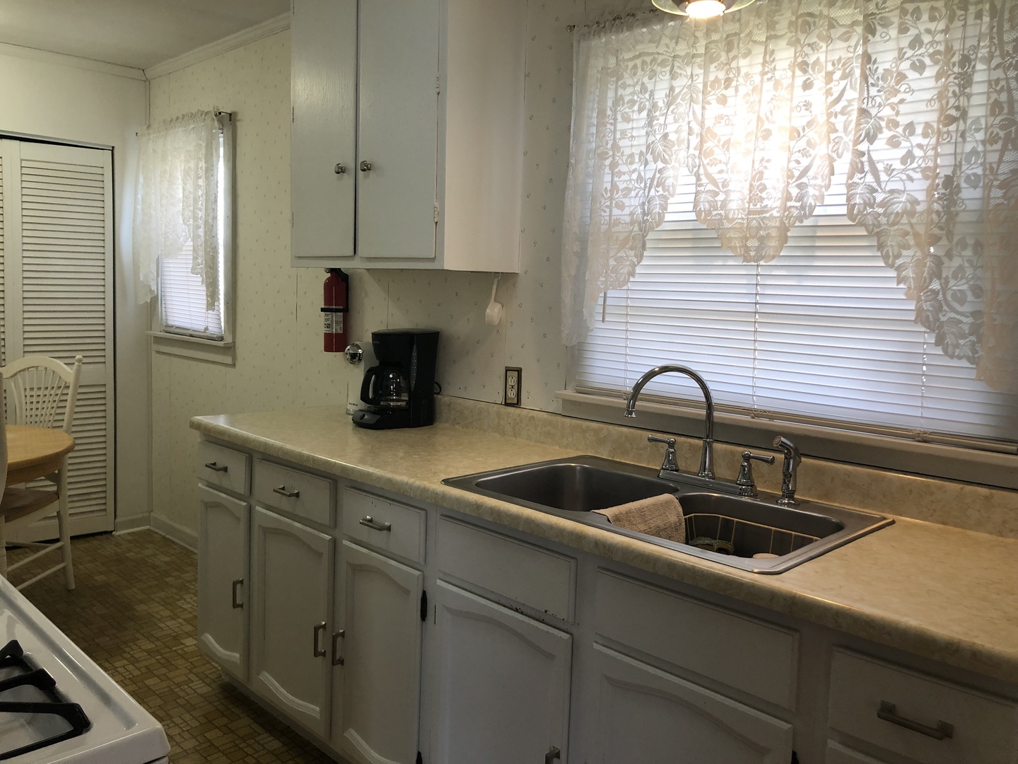 19020 Springfield Avenue Flossmoor, IL 60422 - Photo 5 of 25 a kitchen with a sink and cabinets