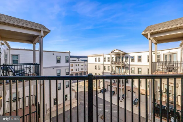 a view of a street from a balcony
