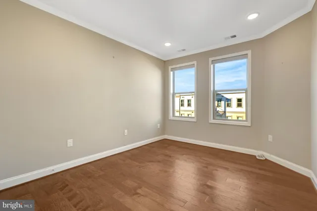 an empty room with windows