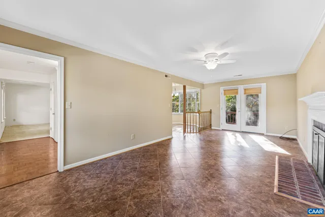 a view of a room with window and cabinet
