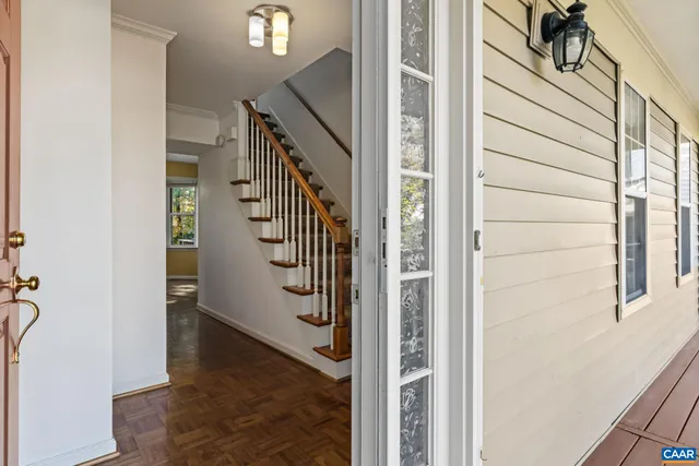 a view of an empty room with a fireplace