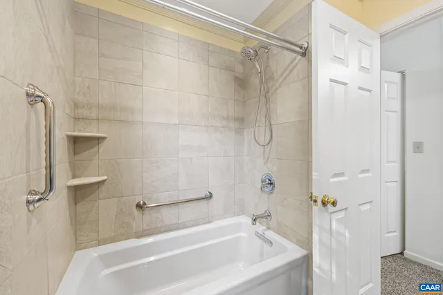 a view of a house with brick walls