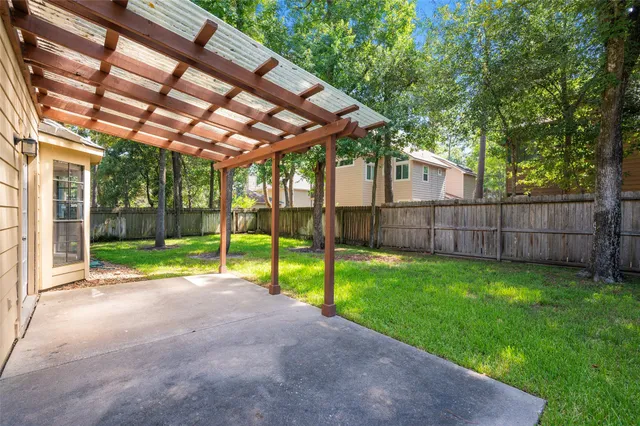 a view of swimming pool with a backyard