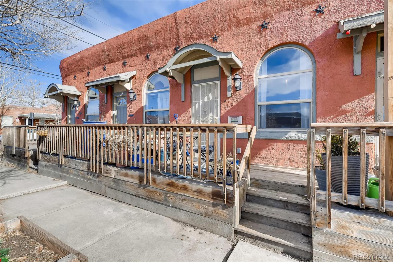 470 Inca Street Denver, CO 80204 - Photo 1 of 11 a view of brick house with large windows