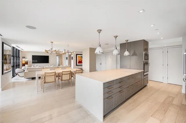 a large room with lots of table and chairs