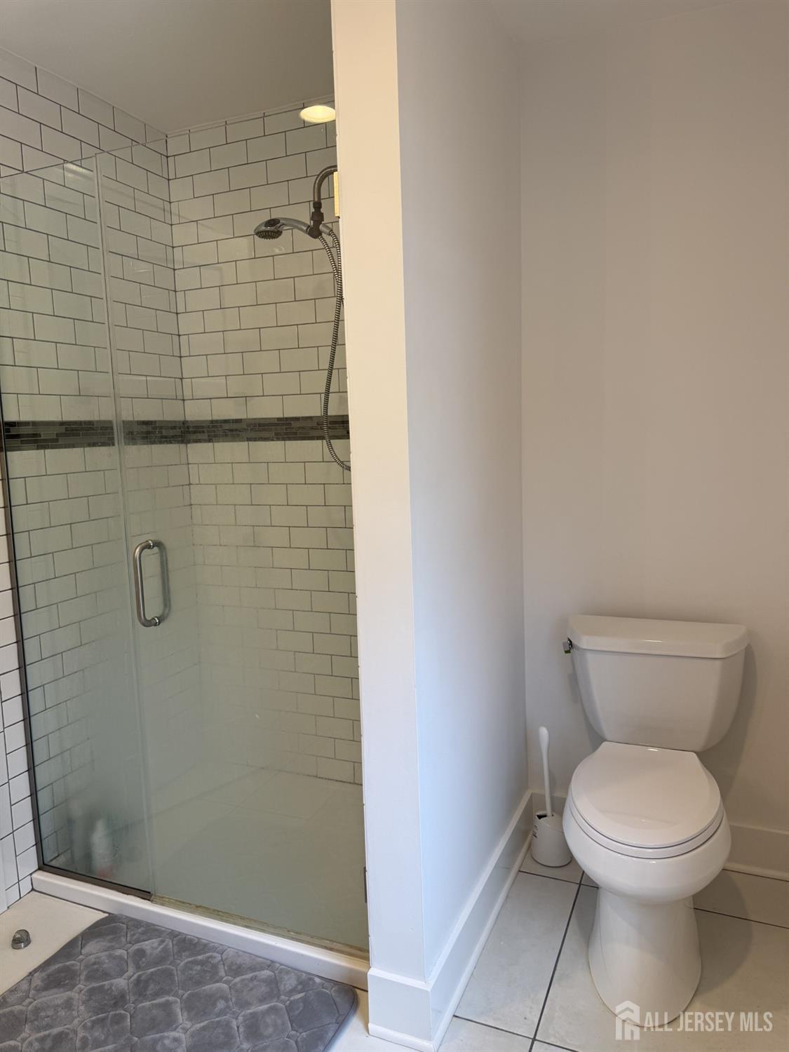 66 Main Street, Unit 3 Peapack, NJ 07977 - Photo 11 of 13 a bathroom with a toilet