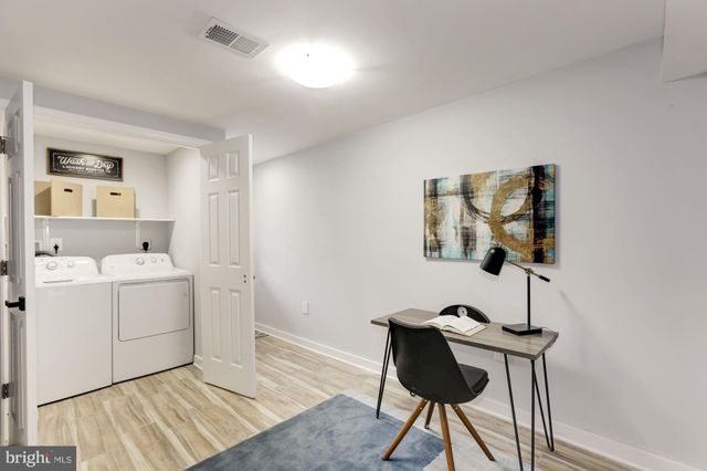 a room with a workspace