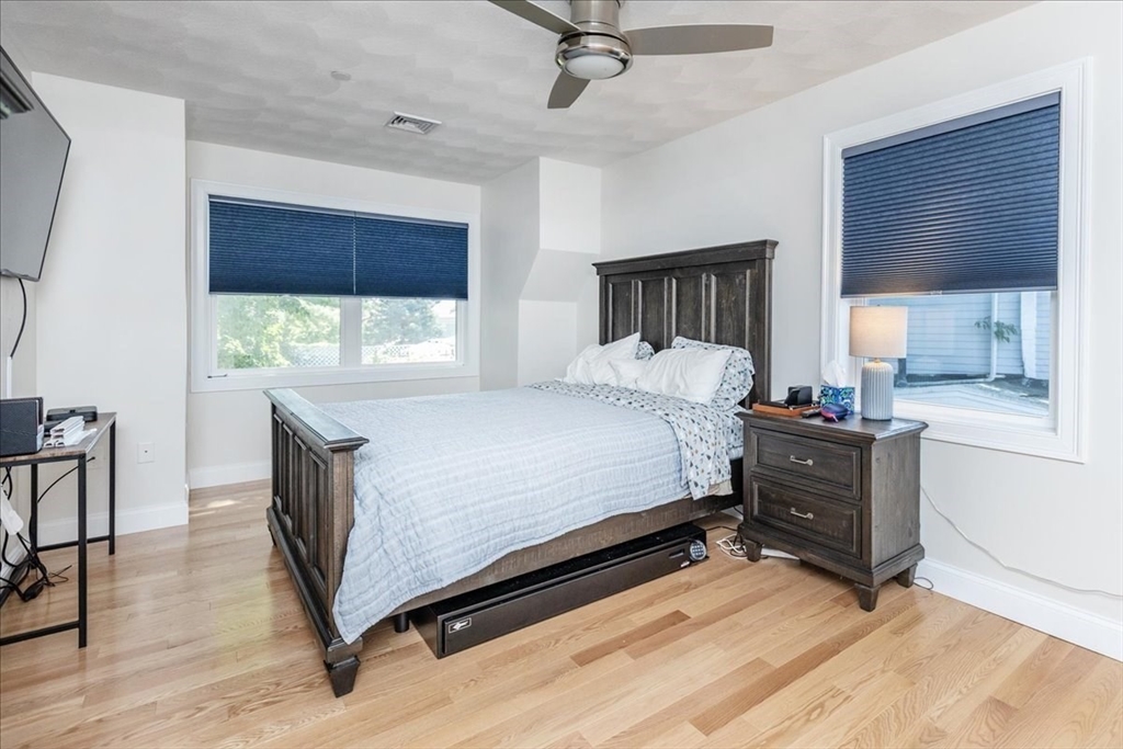 105 Green Street, Unit 4 Marblehead, MA 01945 - Photo 16 of 30 a bedroom with a bed window and a dresser
