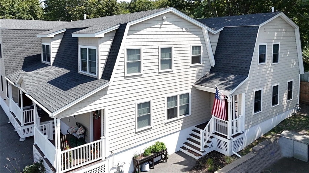 105 Green Street, Unit 4 Marblehead, MA 01945 - Photo 26 of 30 a view of a house with a yard