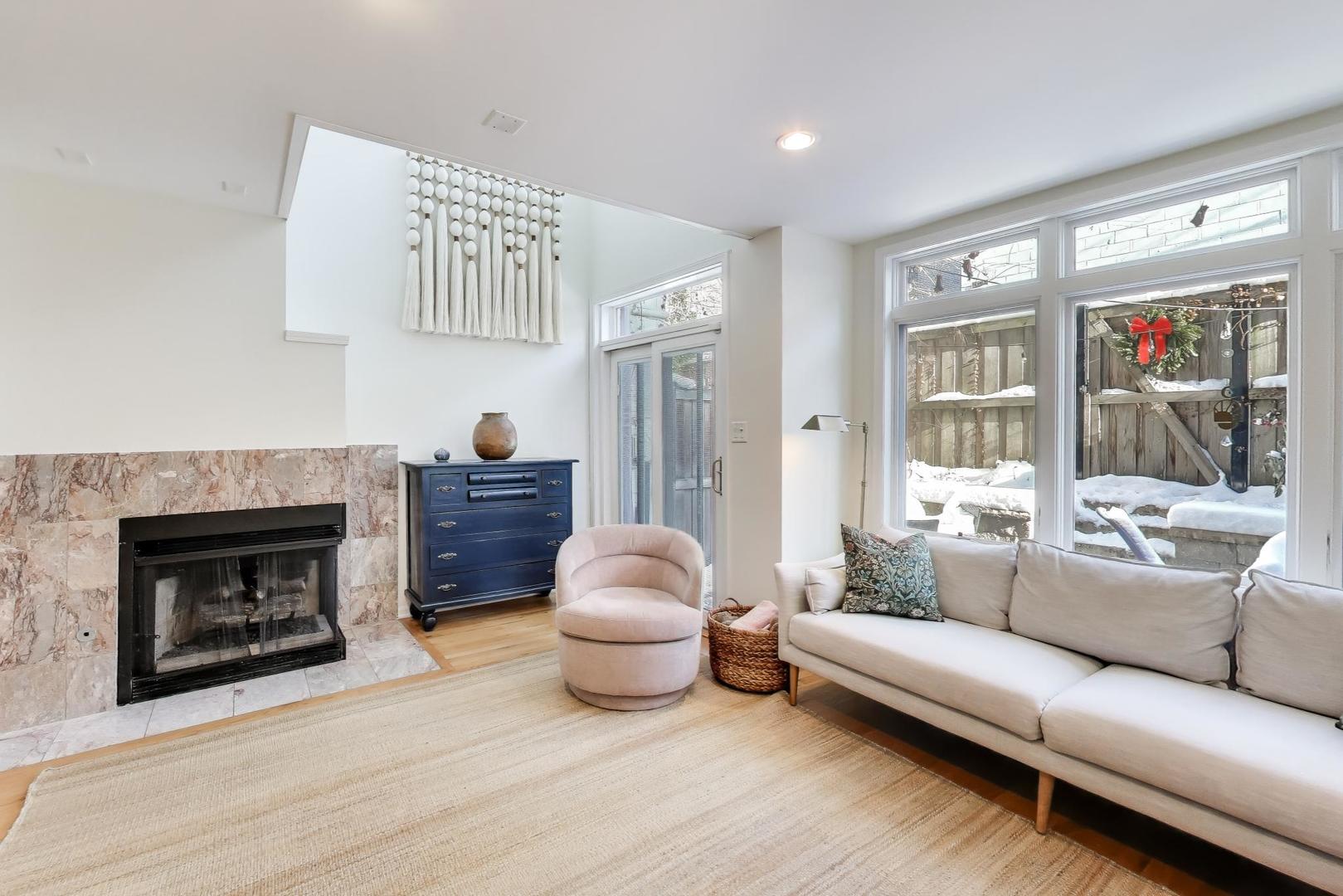 2737 North Janssen Avenue, Unit B Chicago, IL 60614 - Photo 12 of 31 a living room with furniture and a fireplace