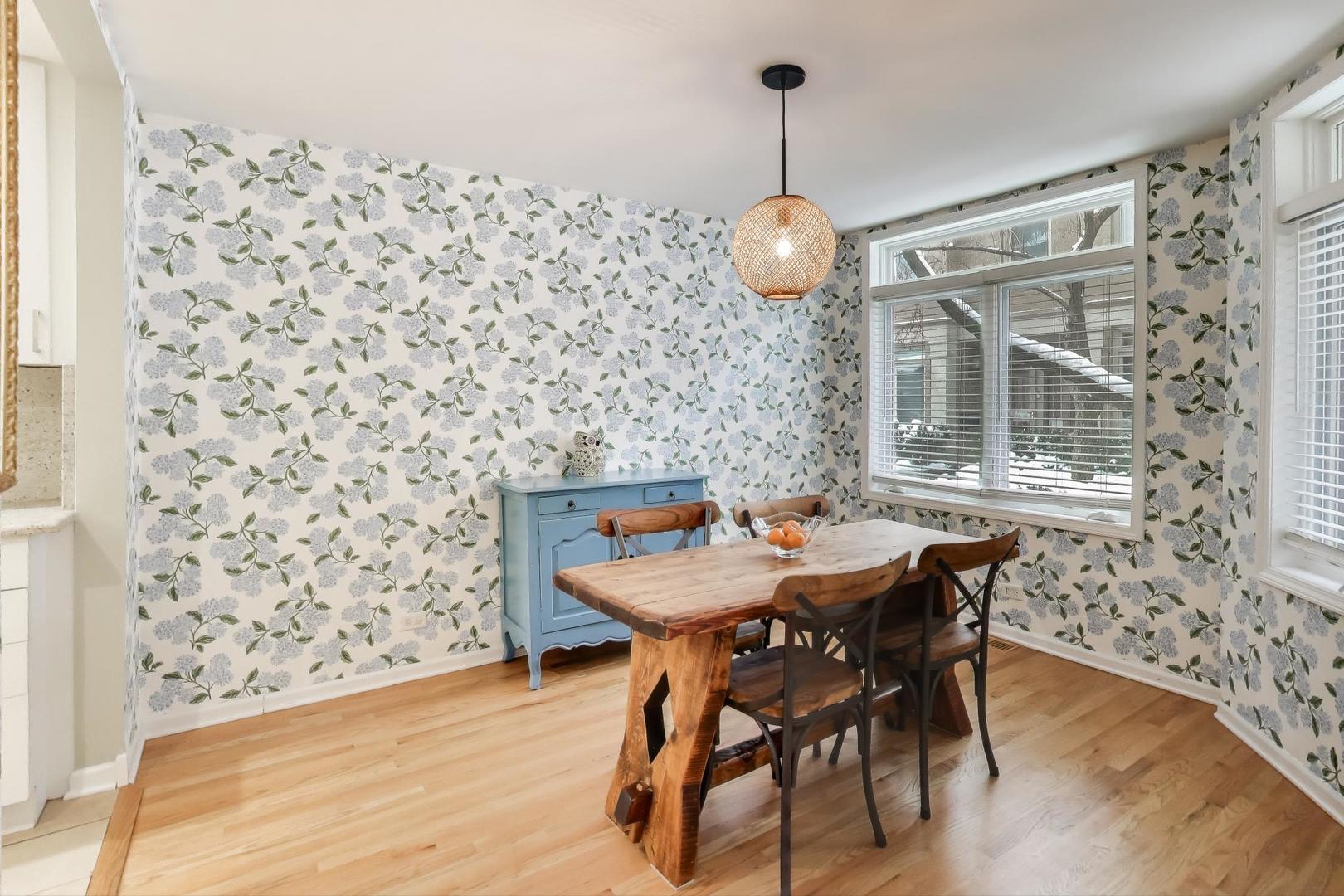2737 North Janssen Avenue, Unit B Chicago, IL 60614 - Photo 7 of 31 a view of a dining room with furniture and wooden floor