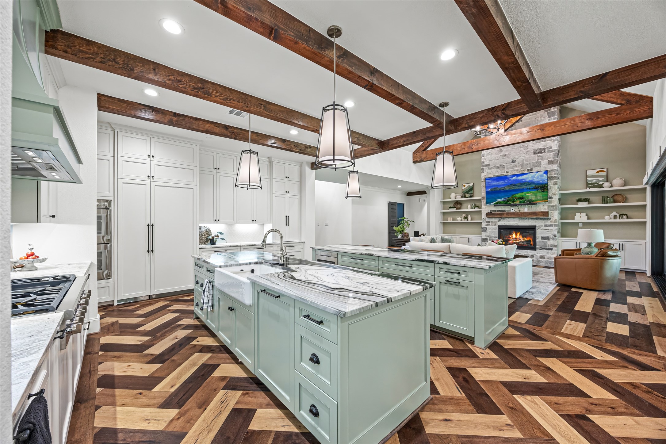 19314 Chateau Ridge Court Tomball, TX 77377 - Photo 10 of 50 Panel-ready refrigerator and dishwasher blend seamlessly into the custom cabinetry for a clean, elevated look