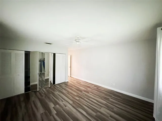 a bathroom with a sink toilet and window