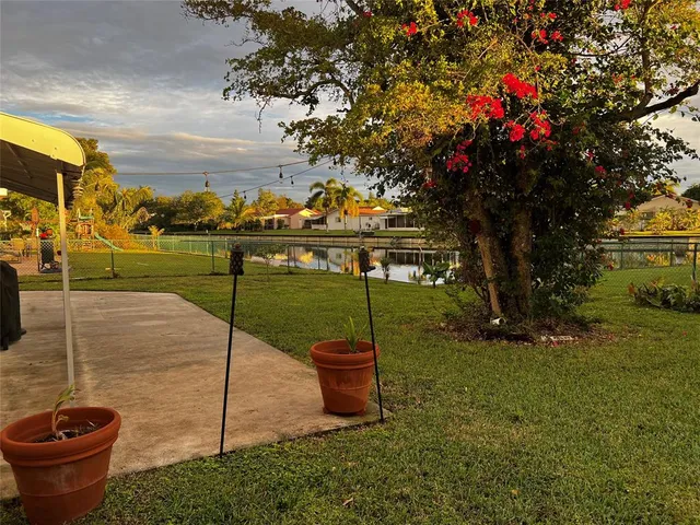 a front view of house with garden
