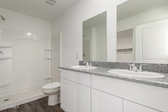 a bathroom with a bathtub and shower