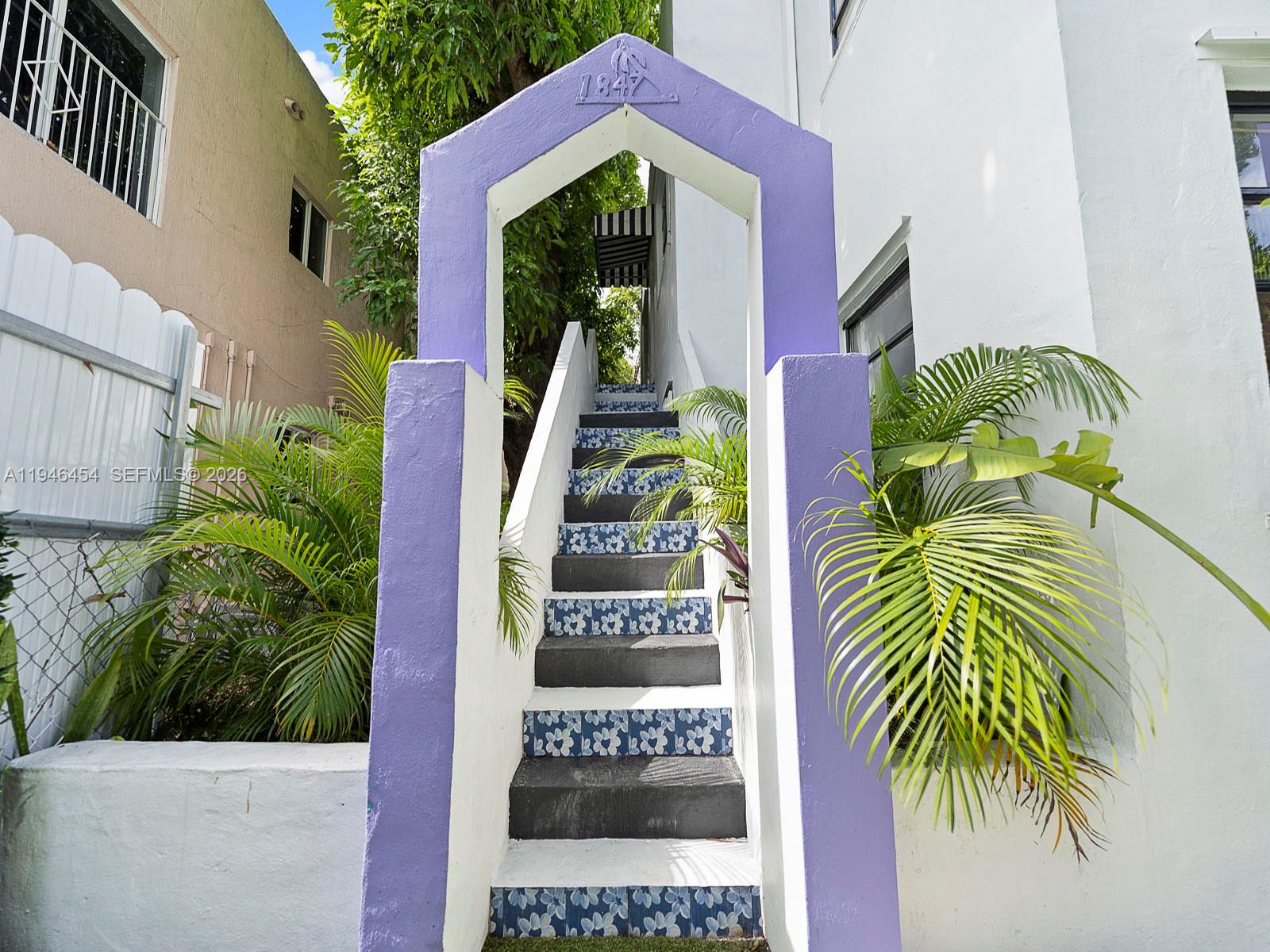 1845 Southwest 9th Street Miami, FL 33135 - Photo 12 of 31 a view of a house with a yard and plants