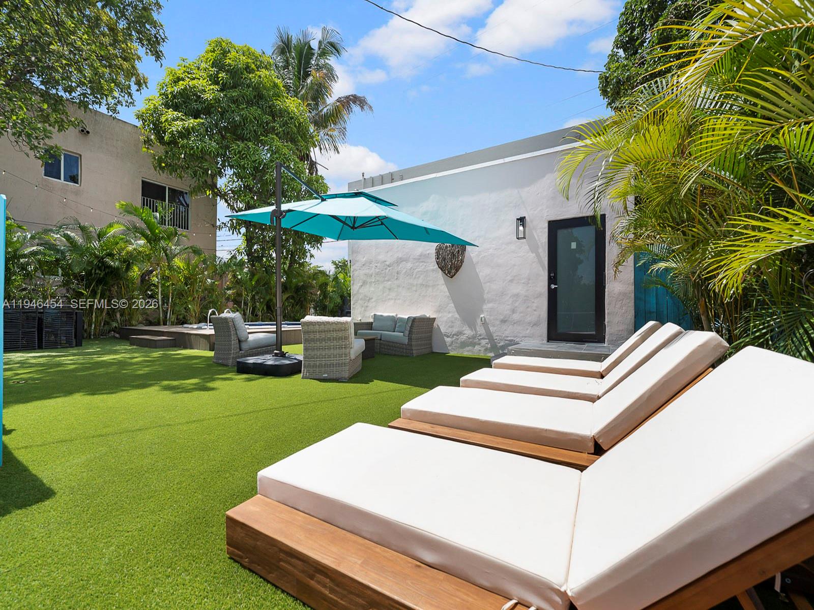 1845 Southwest 9th Street Miami, FL 33135 - Photo 19 of 31 a front view of a house with garden