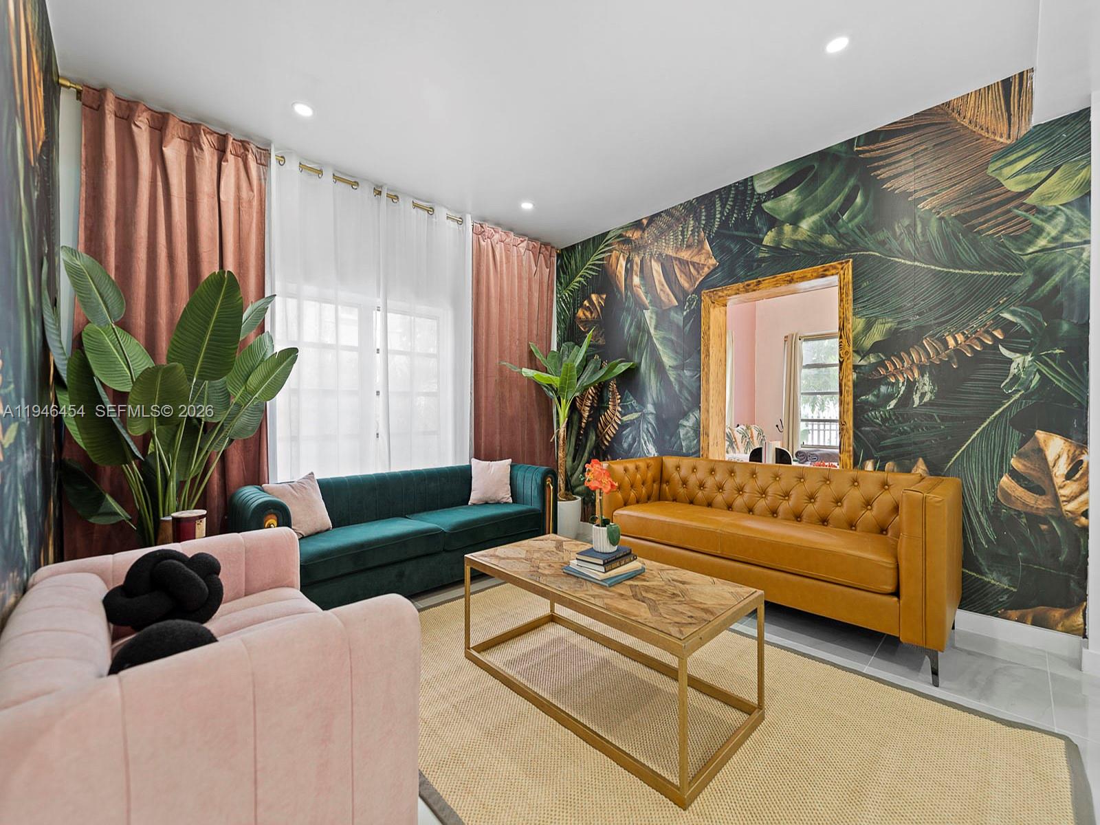 1845 Southwest 9th Street Miami, FL 33135 - Photo 2 of 31 a living room with furniture and a potted plant