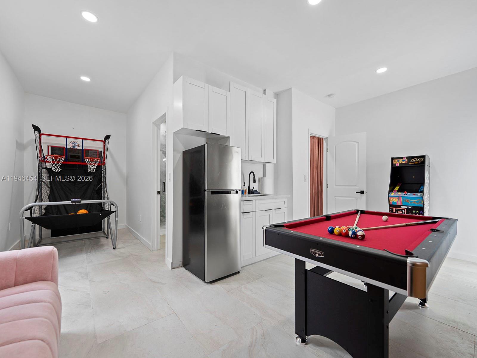 1845 Southwest 9th Street Miami, FL 33135 - Photo 21 of 31 a kitchen with a refrigerator and a stove