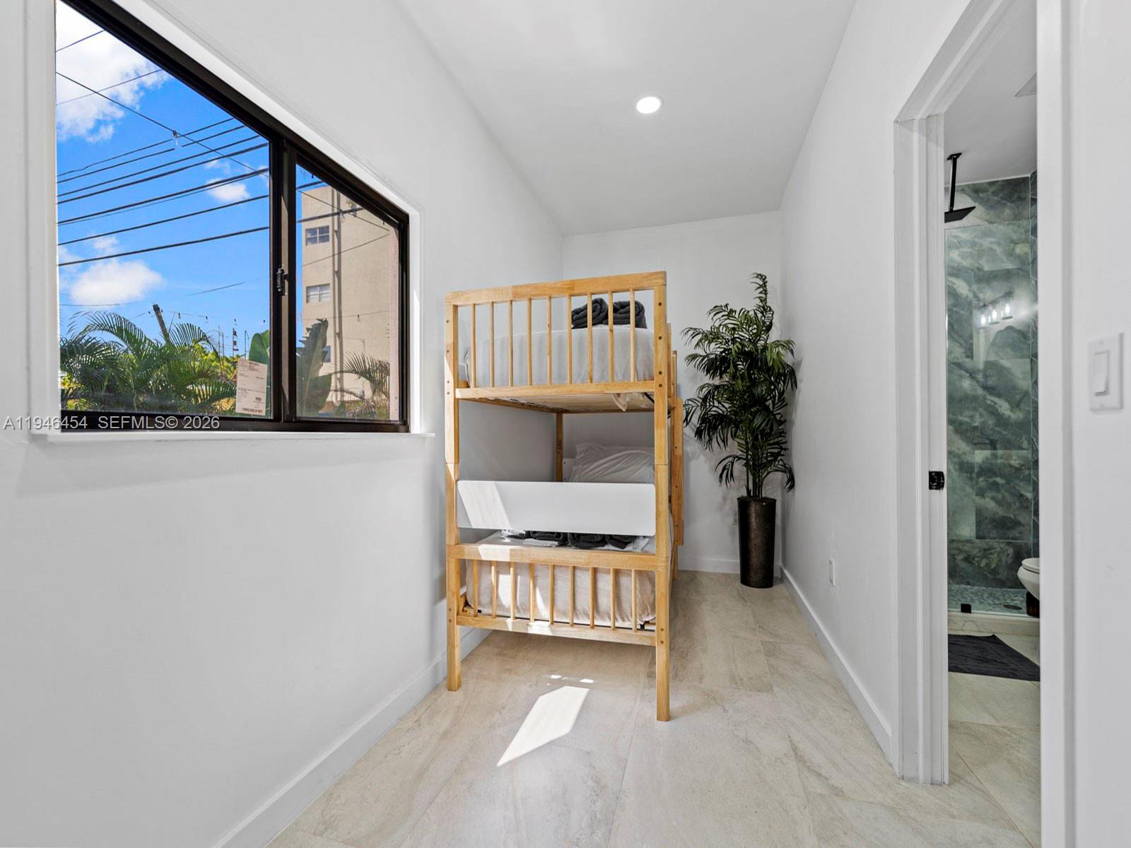 1845 Southwest 9th Street Miami, FL 33135 - Photo 22 of 31 a view of front door and bedroom