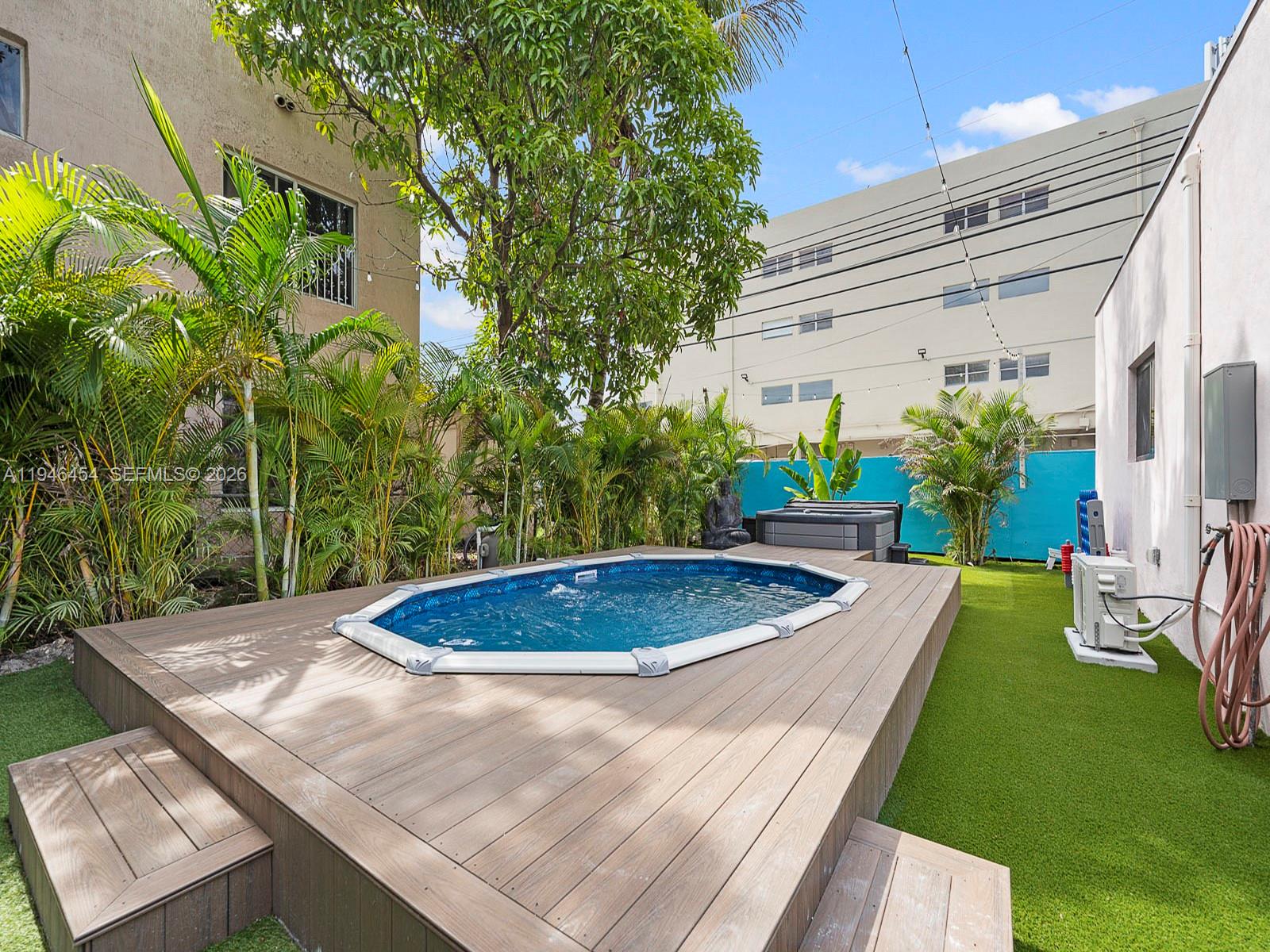 1845 Southwest 9th Street Miami, FL 33135 - Photo 24 of 31 a view of a backyard with plants and outdoor seating