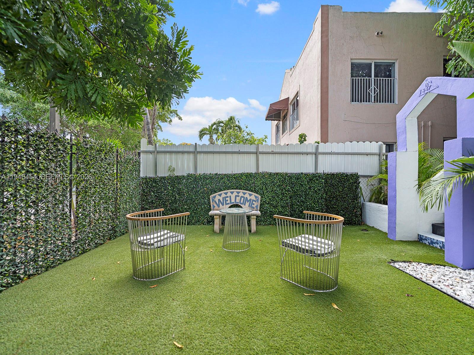 1845 Southwest 9th Street Miami, FL 33135 - Photo 30 of 31 a view of a chair and table in backyard of the house
