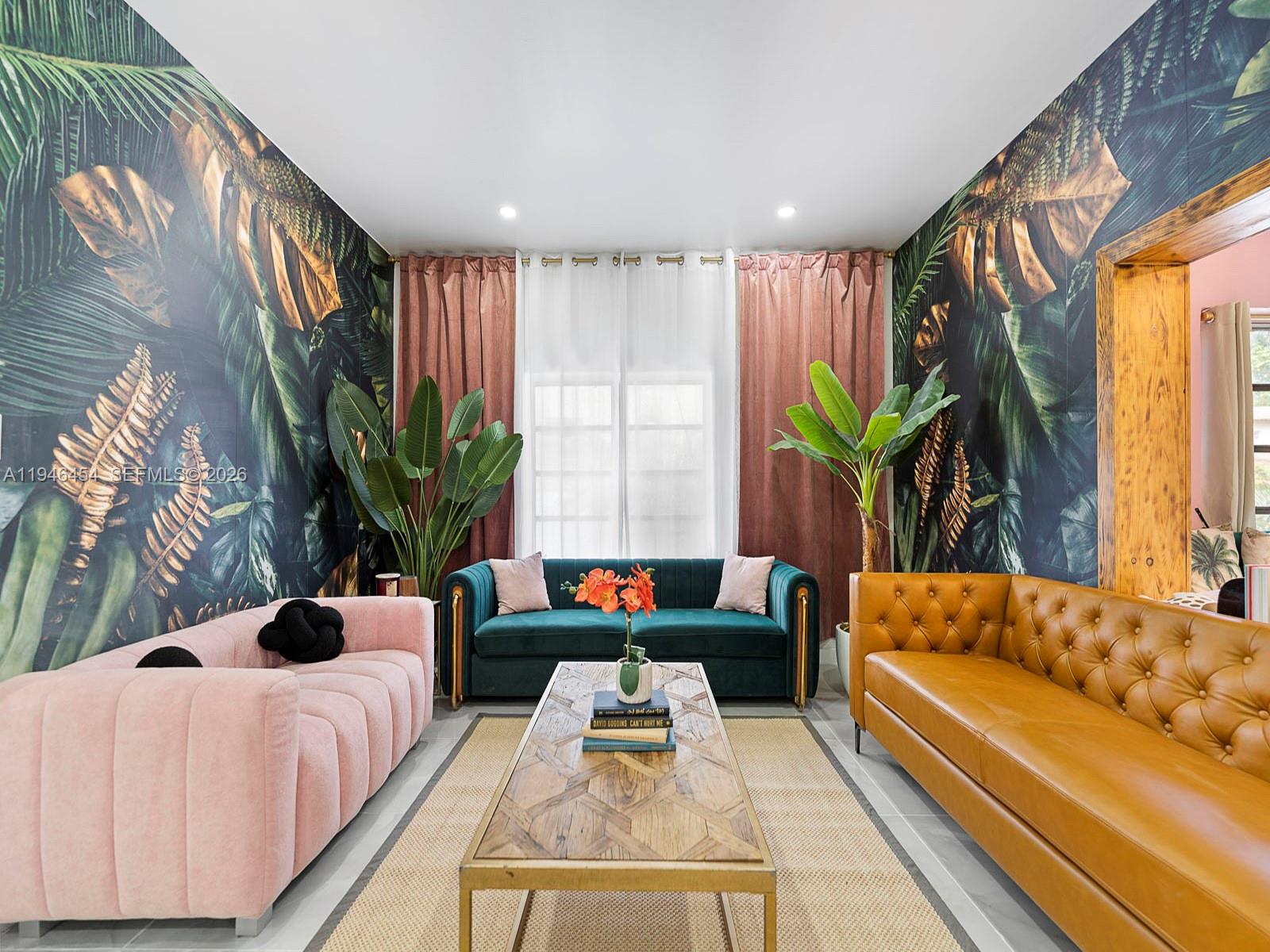 1845 Southwest 9th Street Miami, FL 33135 - Photo 3 of 31 a living room with furniture and a potted plant