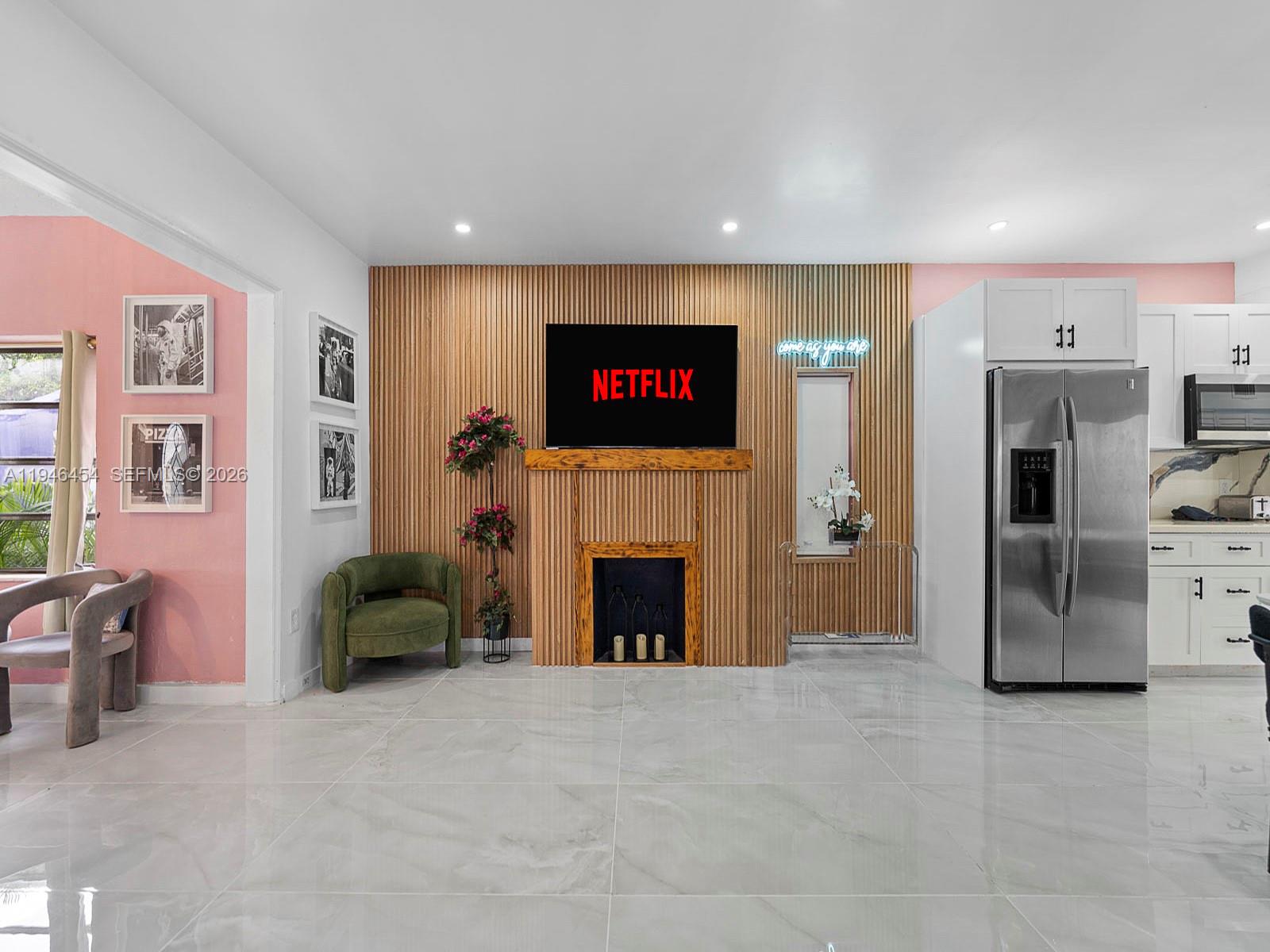 1845 Southwest 9th Street Miami, FL 33135 - Photo 5 of 31 a living room with furniture and a fireplace