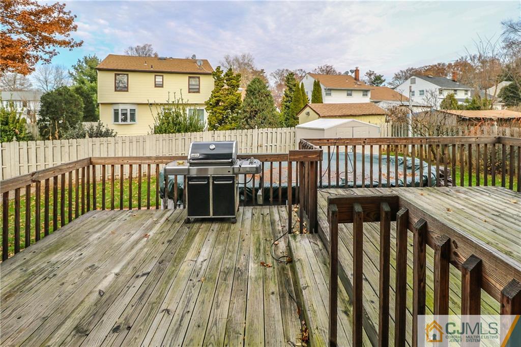 7 Paddock Court Edison, NJ 08820 - Photo 23 of 23 a view of a balcony with wooden floor