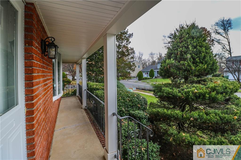 7 Paddock Court Edison, NJ 08820 - Photo 8 of 23 a view of a pathway of a patio