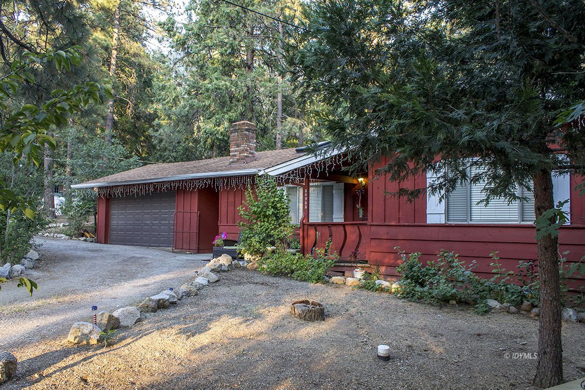 54955 South Circle Drive Idyllwild, CA 92549 - Photo 3 of 31 a view of a house with a small yard and a large tree