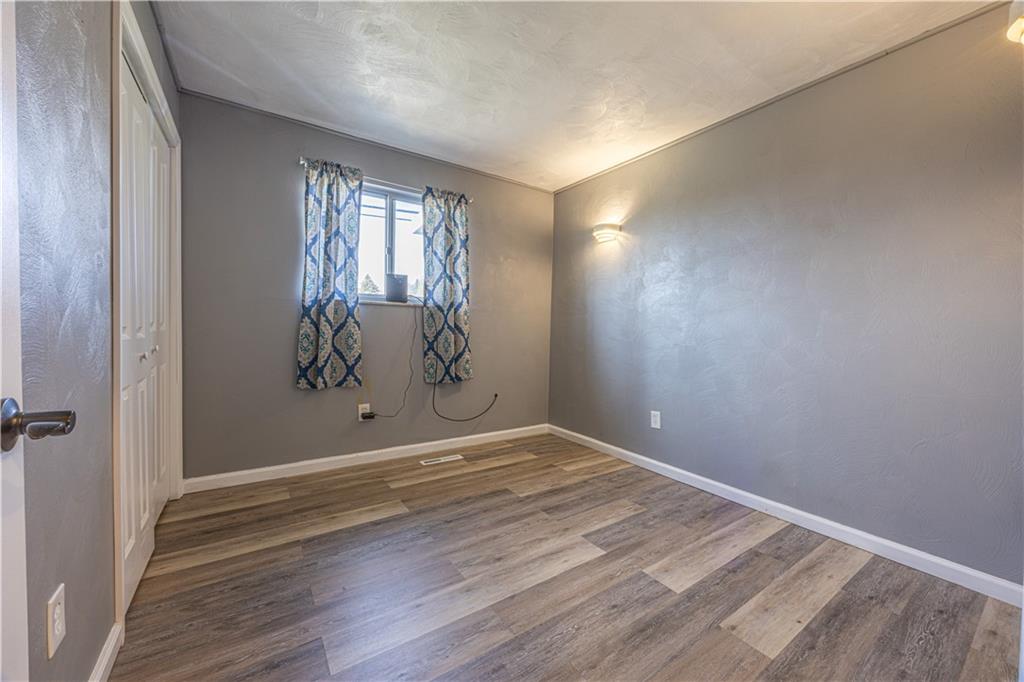 411 McClellandtown Road Uniontown, PA 15401 - Photo 18 of 33 wooden floor in a empty room