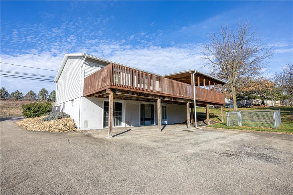 411 McClellandtown Road Uniontown, PA 15401 - Photo 2 of 33 a view of a house with a yard