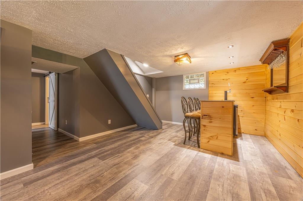 411 McClellandtown Road Uniontown, PA 15401 - Photo 22 of 33 a view of a livingroom with furniture and a ceiling fan