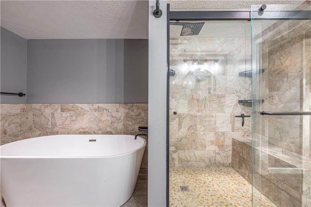 411 McClellandtown Road Uniontown, PA 15401 - Photo 30 of 33 a bathroom with a bathtub and shower