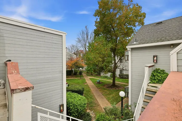 a view of a house with backyard
