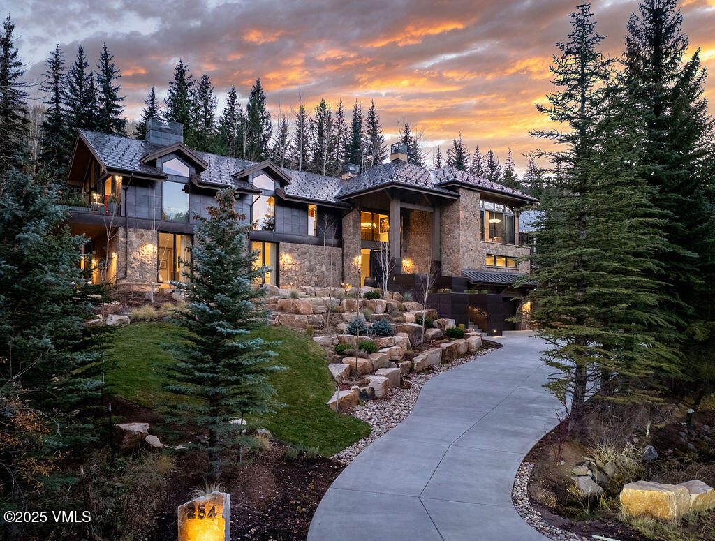 254 Beaver Dam Road Vail, CO 81657 - Photo 1 of 46 a view of a chairs and table in the terrace