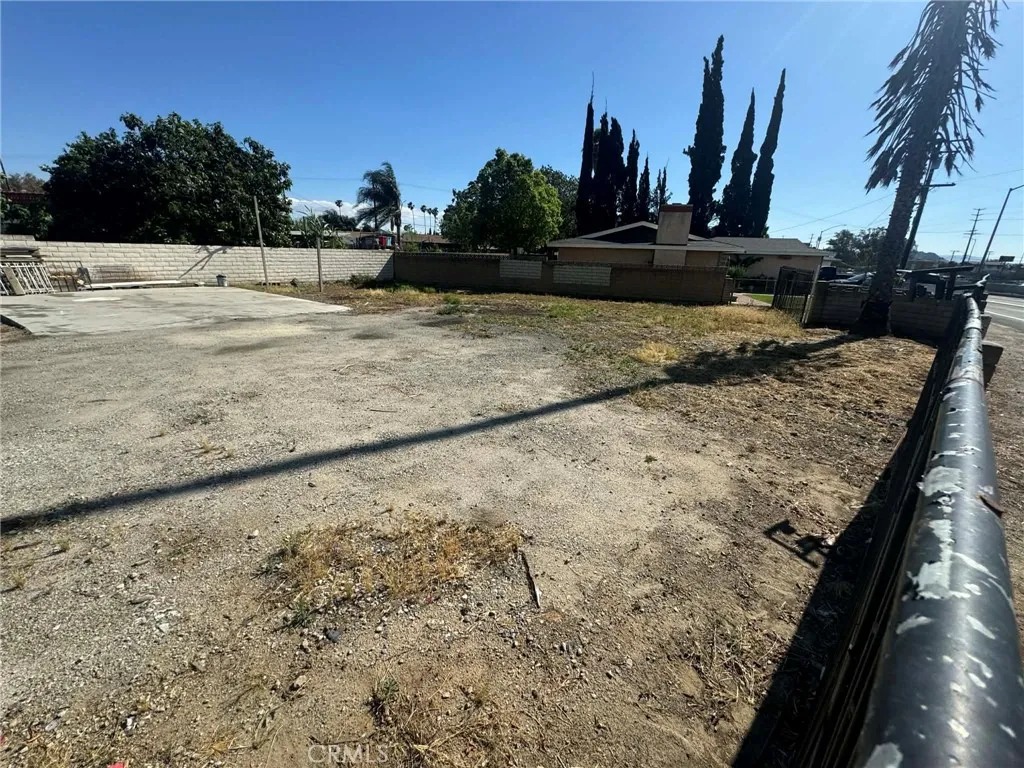 0 East La Cadena Drive Riverside, CA 92507 - Photo 6 of 12 a view of swimming pool with outdoor seating and trees in the background