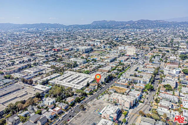 an aerial view of a city with lots of residential buildings