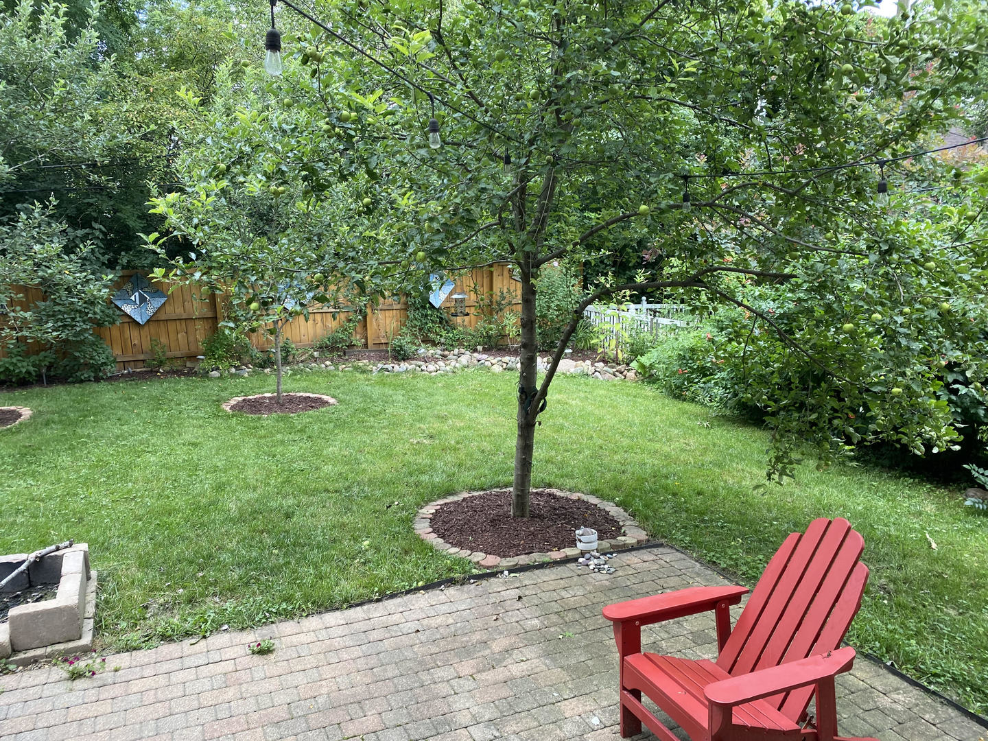 26668 Highway 83 Mundelein, IL 60060 - Photo 40 of 41 a backyard of a house with table and chairs
