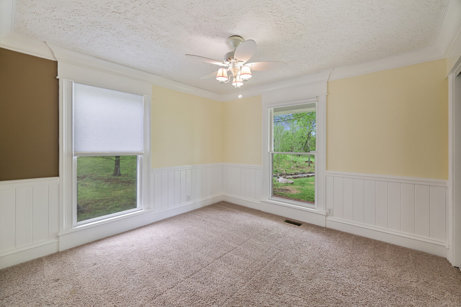 5700 Cane Ridge Road Antioch, TN 37013 - Photo 15 of 61 an empty room with windows and fan
