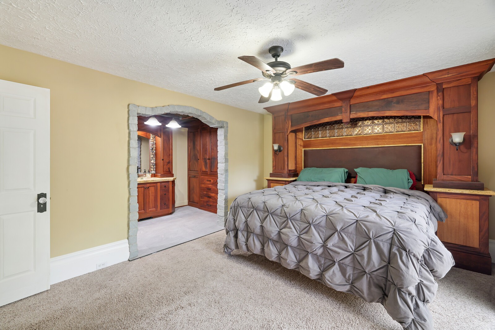 5700 Cane Ridge Road Antioch, TN 37013 - Photo 19 of 61 a bedroom with a bed and a chandelier